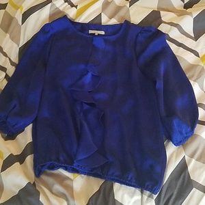 Blue shimmery blouse with ruffle
